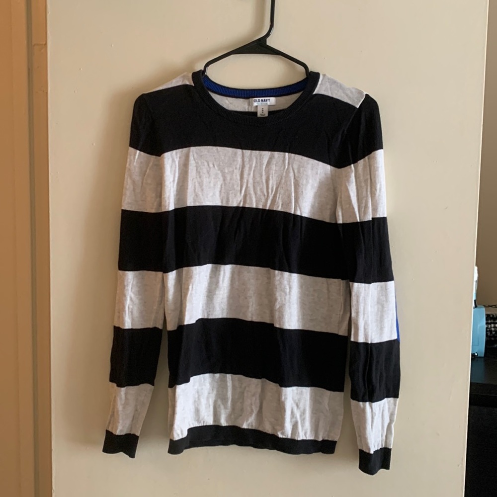 Black and light gray striped sweater with blue elbow patches